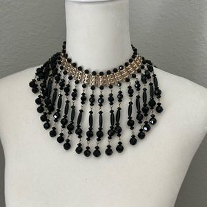 NWOT Vintage Black and gold necklace. Beads are made of glass!